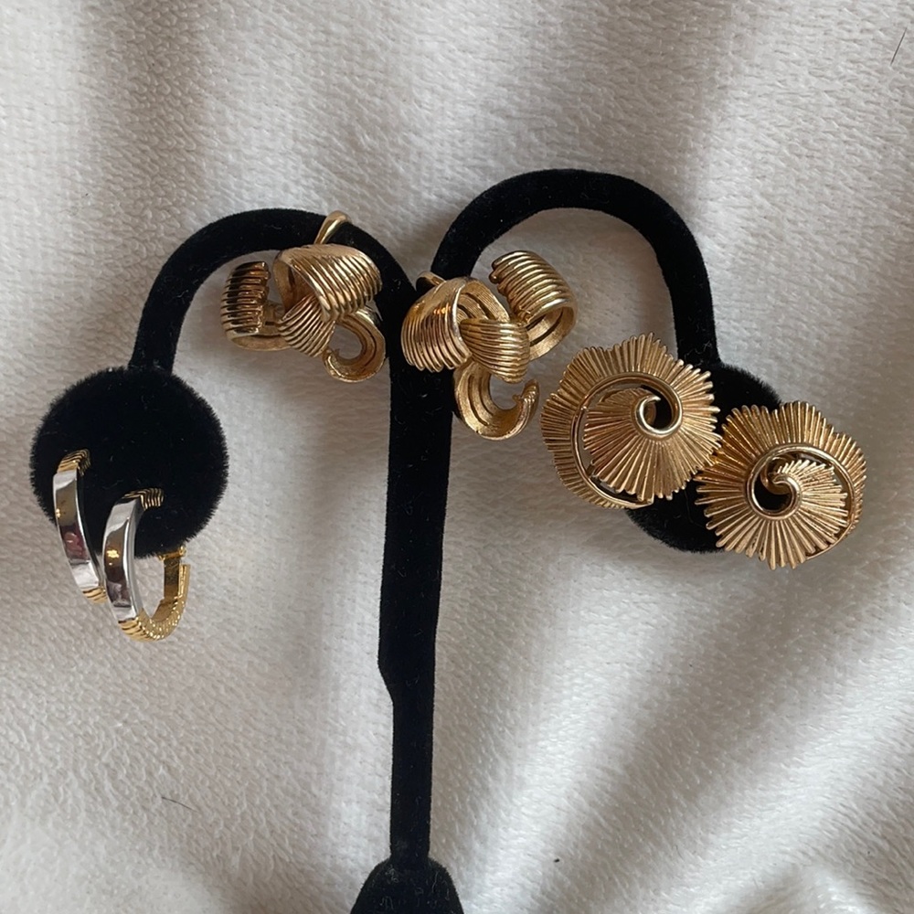 THREE pair of Trifari gold tone clip on earrings